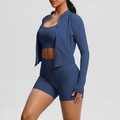 Detail of navy yoga set showing side pockets on shorts and zipper on the athletic jacket - S / Navy Blue