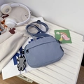 Blue nylon crossbody phone bag with adjustable strap and checkered bear charm pendant - Blue (With Charm)
