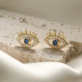 Minimalist gold-plated evil eye stud earrings with white zircons and blue center stone - Gold