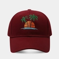 Wine red baseball cap featuring a detailed tropical palm tree and sunset embroidery design. - Adjustable / Burgundy