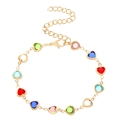 Gold heart bracelet with colorful gemstones and hollow charms on a white background - Multicolor Heart Bracelet (K-1418)