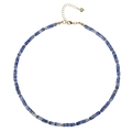 Detail of turquoise beaded necklace featuring gold spacers, lobster clasp and heart charm - Sodalite Necklace