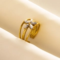 Macro detail of a vintage gold floral ring with marble petals on cream silk fabric - Adjustable Open / Gold-Marble White