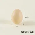 Realistic PU faux egg stress toy in light brown matte finish, 5.5cm tall, weight 10g - Off White