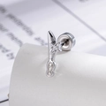 Star-shaped cartilage earring with micro-pave zircon on a white curved surface - Knife Style (A724-餐刀)