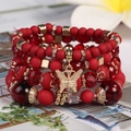 Böhmisches mehrlagiges Perlenarmband mit roten Kristallperlen und Schmetterling-Anhänger - Rot