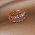 Macro detail of rose gold open ring with colorful zircon stones on champagne silk - Adjustable Open / 11# Large Blue Zircon (Rose Gold)