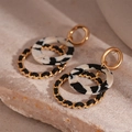 Macro view of gold chain link hoop and marble resin circle earrings on a stone background - Black Double Round Drop Earrings (Silver Pin)
