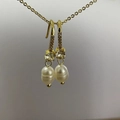 Golden earrings with sparkling zircon inlay and elegant white freshwater pearl pendants - Ear Hook Round Pearl Style (5247207550025)