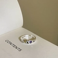 Detail of silver open ring with colorful gemstones and star engraving on a book - Adjustable Open / Star and Color Stone Style (J3400)