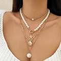 Golden multi-layer beaded necklace set featuring starfish, shells, and faux pearl charms - Gold (5017)