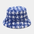 Detailed close-up of blue and white houndstooth pattern on plush faux fur bucket hat - M (56-58cm) / Light Blue