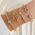 Elegantes 4-teiliges Goldarmband-Set mit Kristall-Unendlichkeitssymbolen und Herzanhängern - HS1159-9 (Gold 4er-Set/Doppelherz/Unendlich/Kristall)