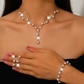 Detail of elegant pearl and rhinestone jewelry set including necklace and bracelet - Rose Gold Artificial Pearl Necklace, Stud Earrings and Bracelet Set (483+747)