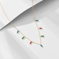 Detailed view of gold chain necklace featuring rectangular rainbow zircon stones - 925 Silver / Gold