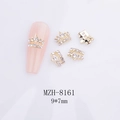 Charm couronne dorée 3D pour nail art avec strass blancs et détails MZH-8161 9x7mm - Style Couronne Strass Or (8161)