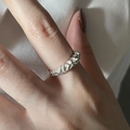 Irregular textured 925 sterling silver ring with molten metal finish on hand - J1966 Lava Industrial Style