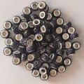 Close-up of sparkling purple pave crystal beads with silver eyelet for jewelry making - Deep purple