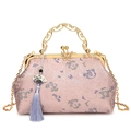 Pink jacquard silk shell handbag with butterfly lock and purple tassel accessory - Pink