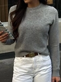 Detail of grey knitted crewneck sweater texture and casual fit on street style model - S / Light Gray
