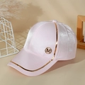 Pink satin baseball cap with metallic M logo and gold trim detailing on brim - Pink