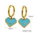Orecchini a cerchio dorati con pendente a cuore blu smaltato e punto luce - Celeste