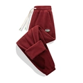 Pantaloni sportivi uomo bordeaux in pile con coulisse bianca ed elastico in vita - S / Borgogna