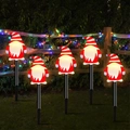 Solar powered Christmas gnome stake lights for outdoor garden path and holiday lawn decor - White Bearded Santa (Black Tube)