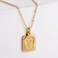 Macro detail of 18K gold-plated rectangle pendant with embossed letter Y on O-chain - Letter Y