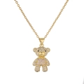Macro shot of gold-plated teddy bear pendant with pink zircons and crystal details - Light Pink
