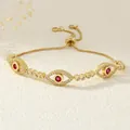 Detail of gold evil eye bracelet with purple zircons and adjustable slider box chain - Purplish Red-BR1208-E