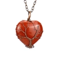 Macro shot of Red Jasper heart pendant with copper Tree of Life wire wrap detail - Antique Copper + Red Jasper