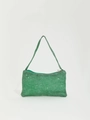 Detail view of emerald green rhinestone underarm bag with shimmering crystal shoulder strap - Green