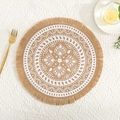 Detail of round jute placemat with white mandala pattern and stylish fringe edges - Natural Jute Tassel White Pattern 1