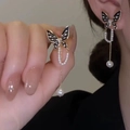 Elegant gold butterfly tassel earrings with black enamel detail and pearls for women - E3150-1-Black Gold Tassel Butterfly Pearl