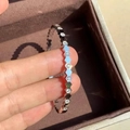 Bracciale a nido d'ape in argento con diamanti tondi in moderno acciaio al titanio - Argento