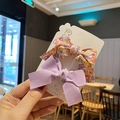 Detail of floral and purple fabric bow hair clips for kids on a white card - 3# Red Floral Purple Set of 2