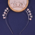 Macro detail of rose gold bridal headband with rhinestones and faux pearls stars - Star Headband / Pearl Rose Gold