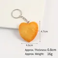 Realistic heart-shaped cookie keychain with textured finish and silver keyring - Heart Cookie Keychain