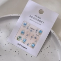 Detailed view of DIY ocean style nail art stickers with pearls and seashell elements - Model MJ-061 Silver Foil
