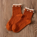 Caramel orange knit crew socks with white lace trim and pearl accents for women - One Size / Orange Red