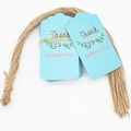 Close-up of light blue 'Thank You' paper tags with jute twine and embossed heart detail - 16-Light Blue Celebrating