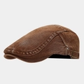 Close-up of vintage washed denim newsboy hat with adjustable side metal buckle - Adjustable / Dark Brown