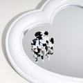 Black and white marble hair claw clip reflecting on a heart-shaped mirror detail - Black and White