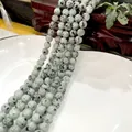 Polished round dalmatian jasper stone beads in light blue and grey with black spots - Tianshan Orchid 48 / 6mm / Approx 63pcs