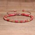 Adjustable woven bracelet featuring red imperial jasper stone beads and gold spacers - No.82 Red Imperial Type 2