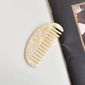 Cellulose acetate hair comb with cream marble pattern in a crescent shape - Yellow Oval