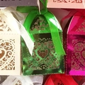 Laser-cut heart wedding favor boxes with satin bows in various metallic colors - Reflective Green