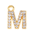 Macro view of gold-tone letter M pendant with clear rhinestones for jewelry making - Letter M-Gold