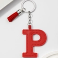 Detail of red PU leather letter P keychain with matching tassel and metal keyring - Red-Letter P